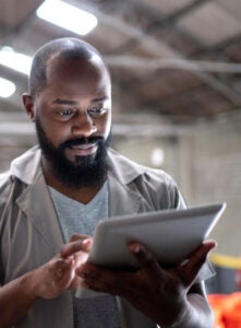 Man using a tablet.